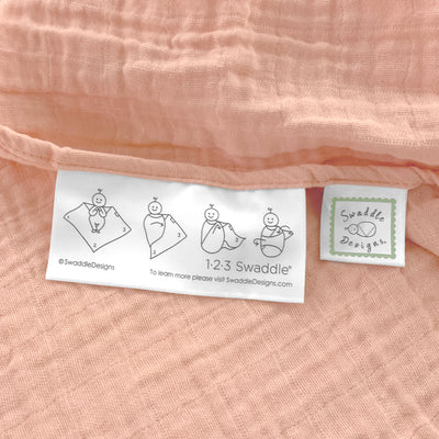 Light Blush Trim Muslin Swaddle main image 0